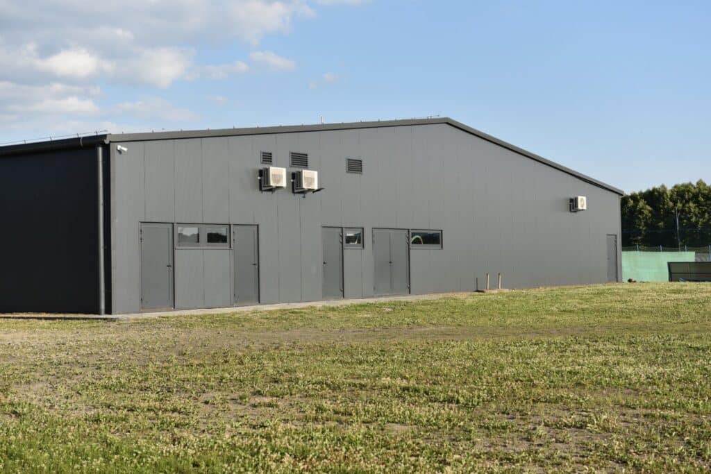 50x80 steel building with clear-span design, overhead doors, and durable steel siding