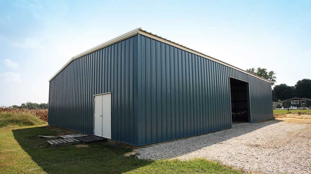 30x40 steel workshop building with overhead doors and insulated wall panels.